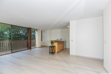 This coveted first-floor *A* unit (2BR/1BA) is ideally located on Makaha Valley Country Club in Hawaii - for sale on GolfHomes.com, golf home, golf lot
