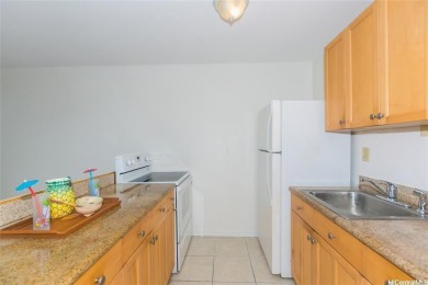 This coveted first-floor *A* unit (2BR/1BA) is ideally located on Makaha Valley Country Club in Hawaii - for sale on GolfHomes.com, golf home, golf lot