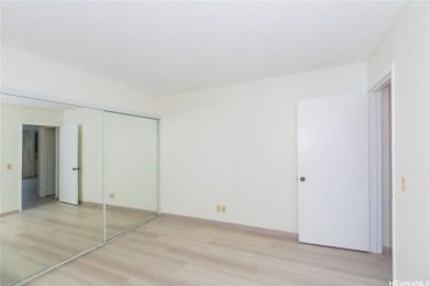 This coveted first-floor *A* unit (2BR/1BA) is ideally located on Makaha Valley Country Club in Hawaii - for sale on GolfHomes.com, golf home, golf lot