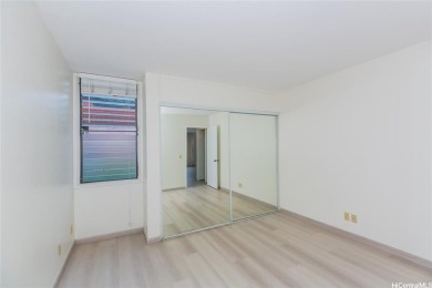 This coveted first-floor *A* unit (2BR/1BA) is ideally located on Makaha Valley Country Club in Hawaii - for sale on GolfHomes.com, golf home, golf lot