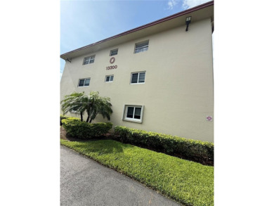 First floor unit! Resort Style 55+ community in Pembroke Pines on Flamingo Lakes Country Club in Florida - for sale on GolfHomes.com, golf home, golf lot