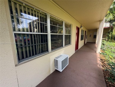First floor unit! Resort Style 55+ community in Pembroke Pines on Flamingo Lakes Country Club in Florida - for sale on GolfHomes.com, golf home, golf lot