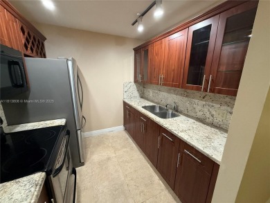 First floor unit! Resort Style 55+ community in Pembroke Pines on Flamingo Lakes Country Club in Florida - for sale on GolfHomes.com, golf home, golf lot