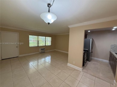 First floor unit! Resort Style 55+ community in Pembroke Pines on Flamingo Lakes Country Club in Florida - for sale on GolfHomes.com, golf home, golf lot