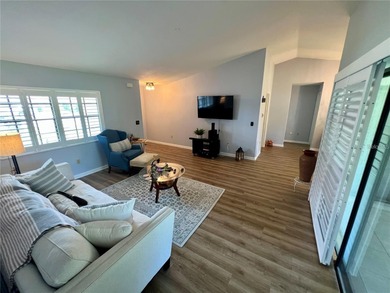 Welcome to 6 Willow Grove Place, a beautiful home nestled in a on The Grand Club - Pine Lakes Course in Florida - for sale on GolfHomes.com, golf home, golf lot