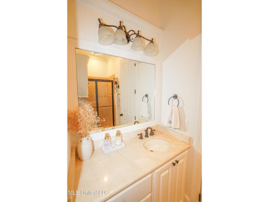 This stunning Lake Caroline waterfront home offers the perfect on Lake Caroline Golf Club in Mississippi - for sale on GolfHomes.com, golf home, golf lot