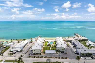 White sand oceanfront condo with breathtaking blue Ocean views on Key Colony Beach Golf Course in Florida - for sale on GolfHomes.com, golf home, golf lot