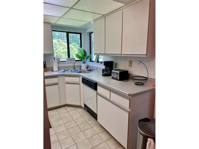 Welcome to 6 Willow Grove Place, a beautiful home nestled in a on The Grand Club - Pine Lakes Course in Florida - for sale on GolfHomes.com, golf home, golf lot