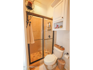 This stunning Lake Caroline waterfront home offers the perfect on Lake Caroline Golf Club in Mississippi - for sale on GolfHomes.com, golf home, golf lot