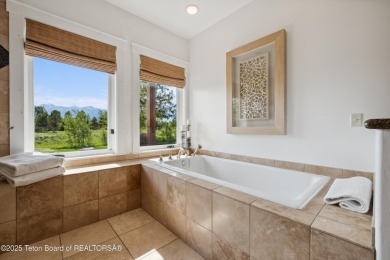 Designed by renowned local architects Dubbe Moulder and on Jackson Hole Golf and Tennis Club in Wyoming - for sale on GolfHomes.com, golf home, golf lot