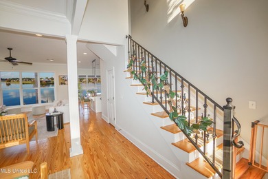 This stunning Lake Caroline waterfront home offers the perfect on Lake Caroline Golf Club in Mississippi - for sale on GolfHomes.com, golf home, golf lot