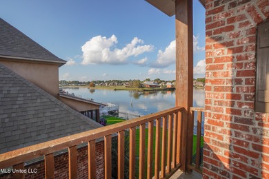 This stunning Lake Caroline waterfront home offers the perfect on Lake Caroline Golf Club in Mississippi - for sale on GolfHomes.com, golf home, golf lot