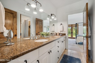 Designed by renowned local architects Dubbe Moulder and on Jackson Hole Golf and Tennis Club in Wyoming - for sale on GolfHomes.com, golf home, golf lot