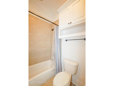 This stunning Lake Caroline waterfront home offers the perfect on Lake Caroline Golf Club in Mississippi - for sale on GolfHomes.com, golf home, golf lot