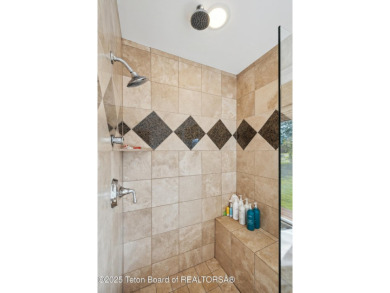 Designed by renowned local architects Dubbe Moulder and on Jackson Hole Golf and Tennis Club in Wyoming - for sale on GolfHomes.com, golf home, golf lot