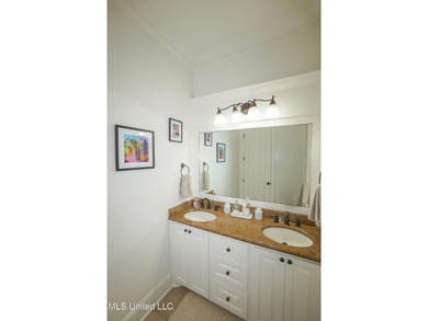 This stunning Lake Caroline waterfront home offers the perfect on Lake Caroline Golf Club in Mississippi - for sale on GolfHomes.com, golf home, golf lot