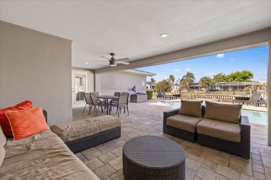 WATERFRONT POOL HOME in the coveted DANA SHORES community of on Rocky Point Golf Course in Florida - for sale on GolfHomes.com, golf home, golf lot