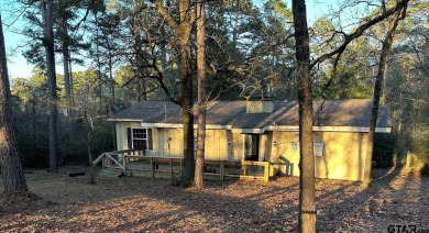 Escape to the country in scenic and relaxing Holly Lake Ranch on Holly Lake Ranch Golf Club in Texas - for sale on GolfHomes.com, golf home, golf lot