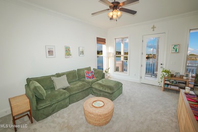 This stunning Lake Caroline waterfront home offers the perfect on Lake Caroline Golf Club in Mississippi - for sale on GolfHomes.com, golf home, golf lot