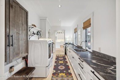 Designed by renowned local architects Dubbe Moulder and on Jackson Hole Golf and Tennis Club in Wyoming - for sale on GolfHomes.com, golf home, golf lot