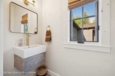 Designed by renowned local architects Dubbe Moulder and on Jackson Hole Golf and Tennis Club in Wyoming - for sale on GolfHomes.com, golf home, golf lot