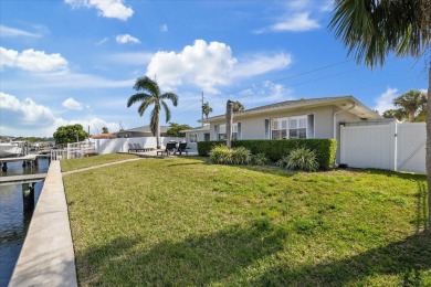 WATERFRONT POOL HOME in the coveted DANA SHORES community of on Rocky Point Golf Course in Florida - for sale on GolfHomes.com, golf home, golf lot