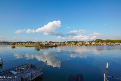 This stunning Lake Caroline waterfront home offers the perfect on Lake Caroline Golf Club in Mississippi - for sale on GolfHomes.com, golf home, golf lot