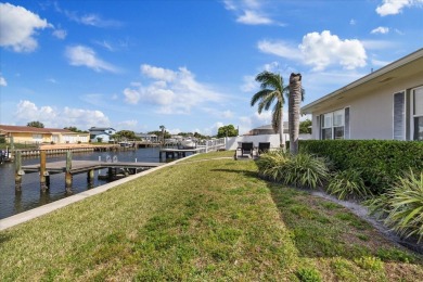 WATERFRONT POOL HOME in the coveted DANA SHORES community of on Rocky Point Golf Course in Florida - for sale on GolfHomes.com, golf home, golf lot