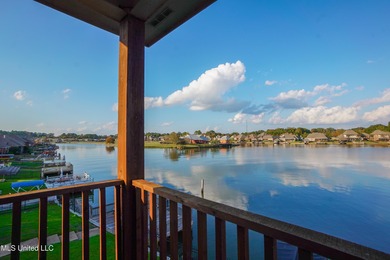 This stunning Lake Caroline waterfront home offers the perfect on Lake Caroline Golf Club in Mississippi - for sale on GolfHomes.com, golf home, golf lot