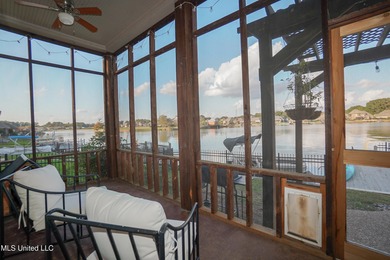 This stunning Lake Caroline waterfront home offers the perfect on Lake Caroline Golf Club in Mississippi - for sale on GolfHomes.com, golf home, golf lot