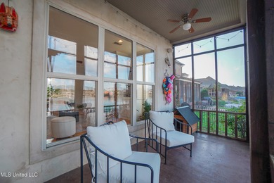 This stunning Lake Caroline waterfront home offers the perfect on Lake Caroline Golf Club in Mississippi - for sale on GolfHomes.com, golf home, golf lot