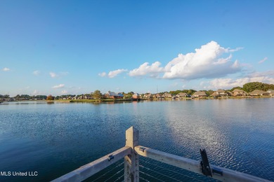 This stunning Lake Caroline waterfront home offers the perfect on Lake Caroline Golf Club in Mississippi - for sale on GolfHomes.com, golf home, golf lot