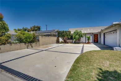This lovely beach home resides in the center of the Huntington on Meadowlark Golf Club in California - for sale on GolfHomes.com, golf home, golf lot