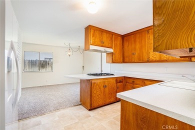 This lovely beach home resides in the center of the Huntington on Meadowlark Golf Club in California - for sale on GolfHomes.com, golf home, golf lot