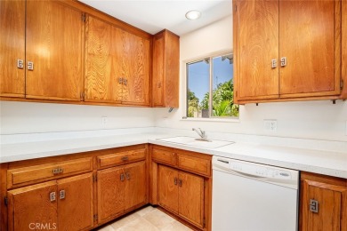 This lovely beach home resides in the center of the Huntington on Meadowlark Golf Club in California - for sale on GolfHomes.com, golf home, golf lot