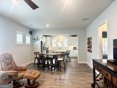 Imagine starting your mornings with coffee on a covered lanai on Canongate Golf At Sun City Peachtree in Georgia - for sale on GolfHomes.com, golf home, golf lot