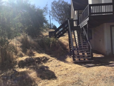 Beautiful home with massive wall of glass to take in the views on The Club at Copper Valley Golf Course in California - for sale on GolfHomes.com, golf home, golf lot