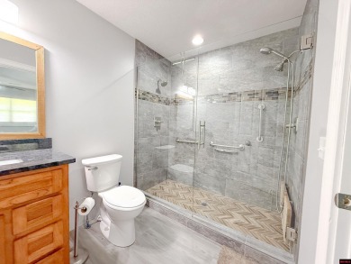 Just steps from the White River, this custom-built 2-bedroom on Rivercliff Golf Course in Arkansas - for sale on GolfHomes.com, golf home, golf lot