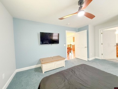 Just steps from the White River, this custom-built 2-bedroom on Rivercliff Golf Course in Arkansas - for sale on GolfHomes.com, golf home, golf lot