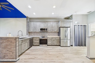 Have you been dreaming of an affordable, updated home on the on Cocoa Beach Country Club in Florida - for sale on GolfHomes.com, golf home, golf lot