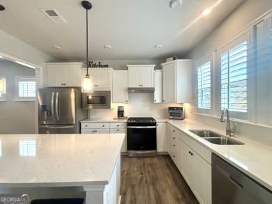 Imagine starting your mornings with coffee on a covered lanai on Canongate Golf At Sun City Peachtree in Georgia - for sale on GolfHomes.com, golf home, golf lot