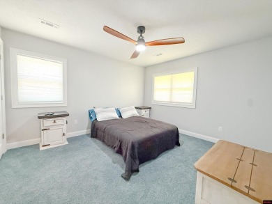 Just steps from the White River, this custom-built 2-bedroom on Rivercliff Golf Course in Arkansas - for sale on GolfHomes.com, golf home, golf lot