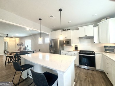 Imagine starting your mornings with coffee on a covered lanai on Canongate Golf At Sun City Peachtree in Georgia - for sale on GolfHomes.com, golf home, golf lot