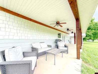 Just steps from the White River, this custom-built 2-bedroom on Rivercliff Golf Course in Arkansas - for sale on GolfHomes.com, golf home, golf lot