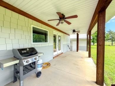 Just steps from the White River, this custom-built 2-bedroom on Rivercliff Golf Course in Arkansas - for sale on GolfHomes.com, golf home, golf lot