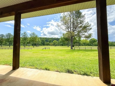 Just steps from the White River, this custom-built 2-bedroom on Rivercliff Golf Course in Arkansas - for sale on GolfHomes.com, golf home, golf lot