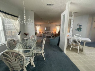 NEW REDUCED PRICE ~ $89,900! Located adjacent to a Florida on Four Lakes Golf Club in Florida - for sale on GolfHomes.com, golf home, golf lot
