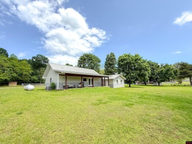 Just steps from the White River, this custom-built 2-bedroom on Rivercliff Golf Course in Arkansas - for sale on GolfHomes.com, golf home, golf lot