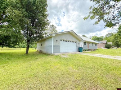 Just steps from the White River, this custom-built 2-bedroom on Rivercliff Golf Course in Arkansas - for sale on GolfHomes.com, golf home, golf lot