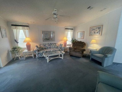 NEW REDUCED PRICE ~ $89,900! Located adjacent to a Florida on Four Lakes Golf Club in Florida - for sale on GolfHomes.com, golf home, golf lot